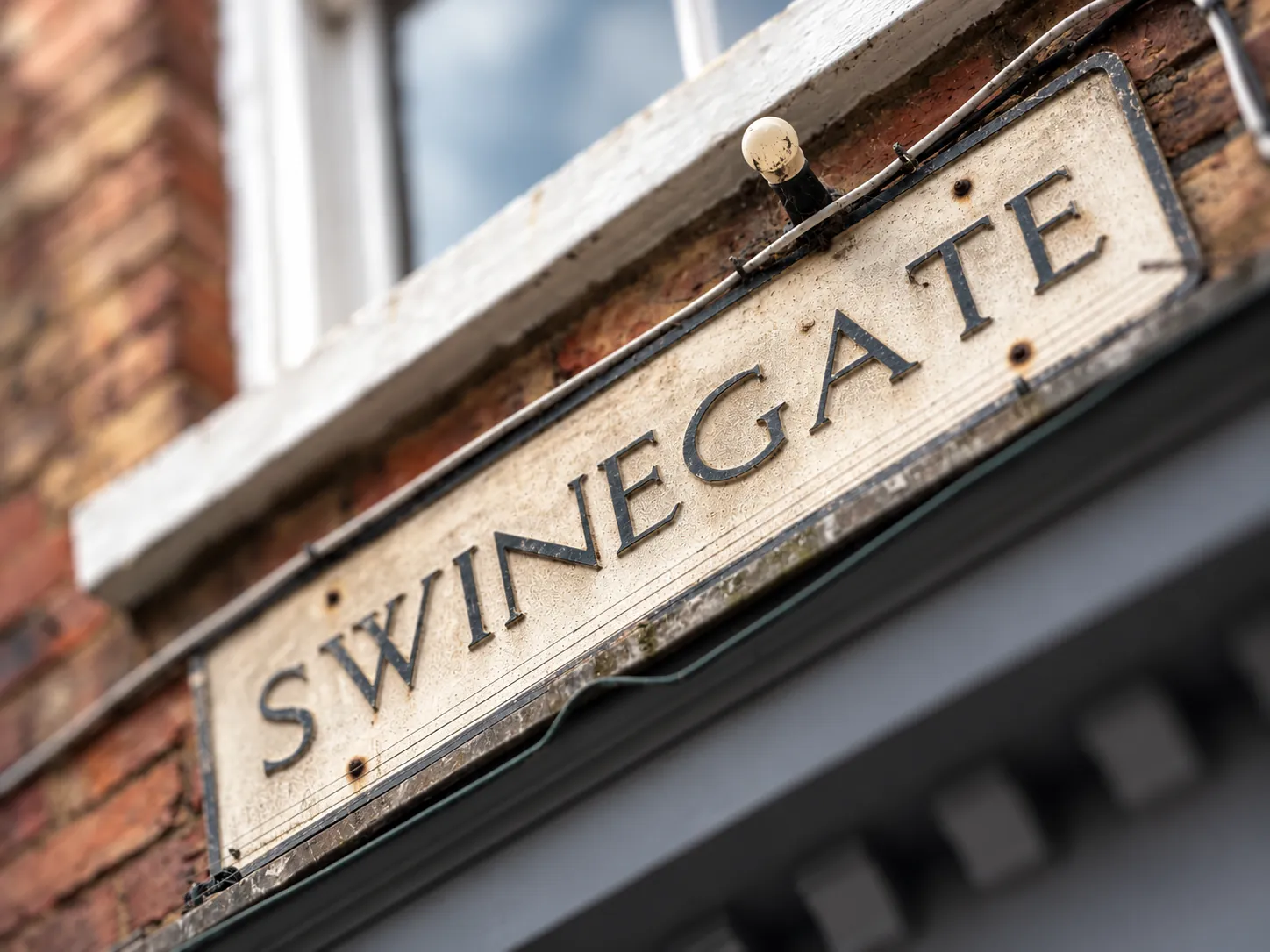 The Swinegate street sign in York, home of the eko create studio